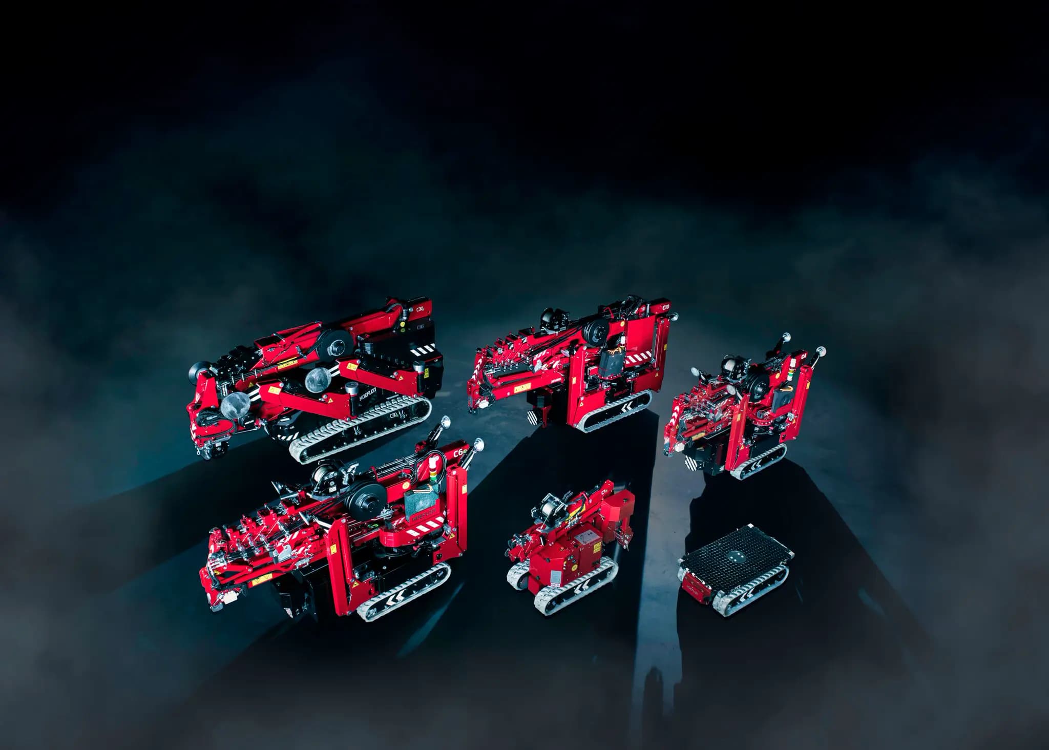 Bild von Hoeflon Kompaktkränen und einem Carrier.